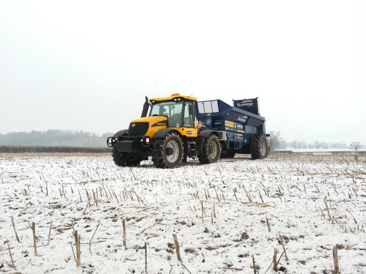 Spreading Compost onto Rape stubble